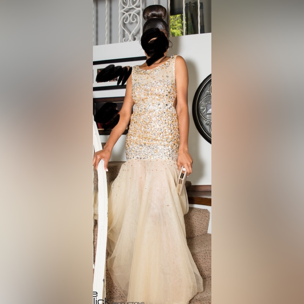 Gold sequence prom dress. Worn one time to prom.. beautiful dress